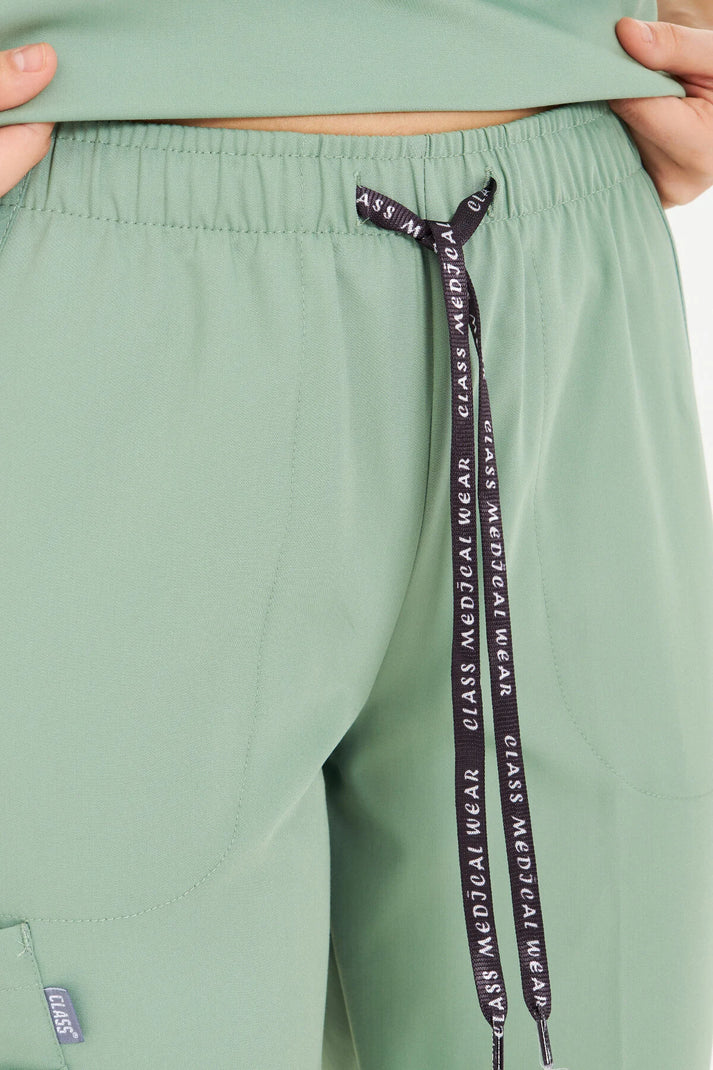 N O V A | Çağla Yeşili Likralı Hakim Yaka Yarım Çıtçıtlı Hemşire Ve Doktor Forması Scrubs